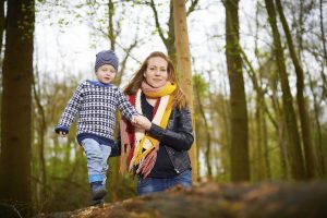 Mother And Son In The Forest