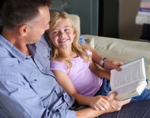 She loves reading with her dad