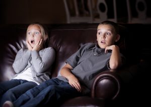 Children watching Shocking Television Programming