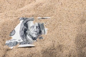 100 Dollar Bill Buried In The Sand