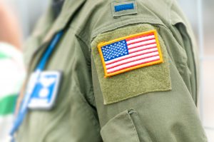 Focus On American Flag On Usaf Uniform Of Person.